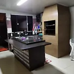 Espaço único com churrasqueira